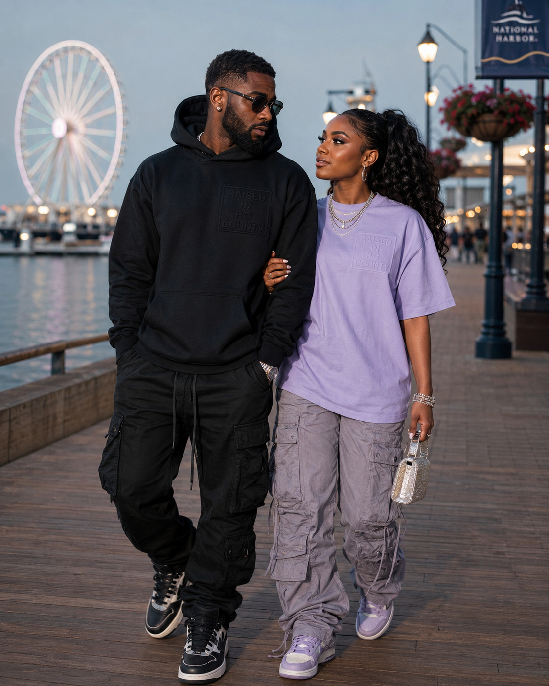 Couple in black hoodie and lavender tee